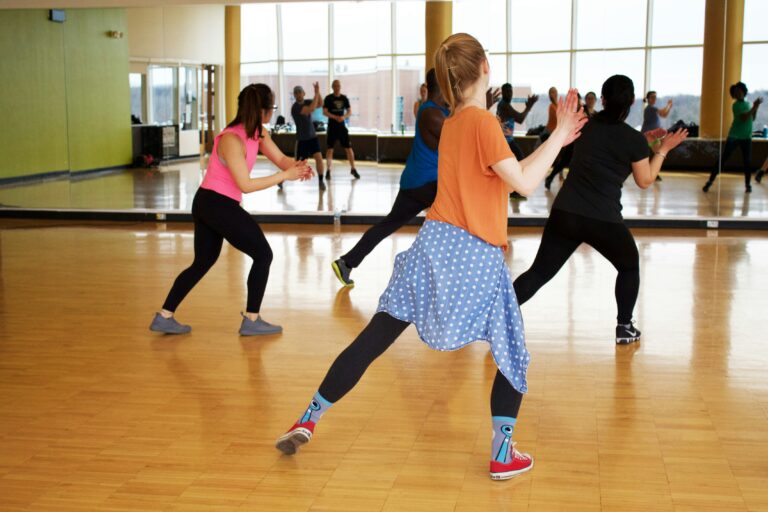 Group of people dancing in a studio